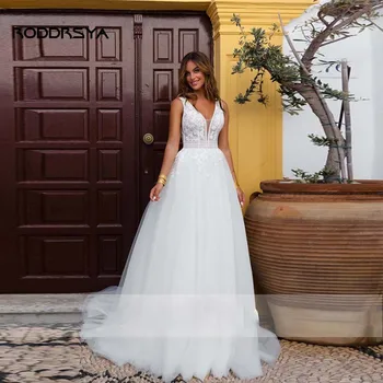 RODDRSYA Plaj düğün elbisesi Zarif V Yaka Backless Dantel Aplikler gelin kıyafeti Yeni A-Line Tül Kolsuz Gelin Elbise Kadınlar Için